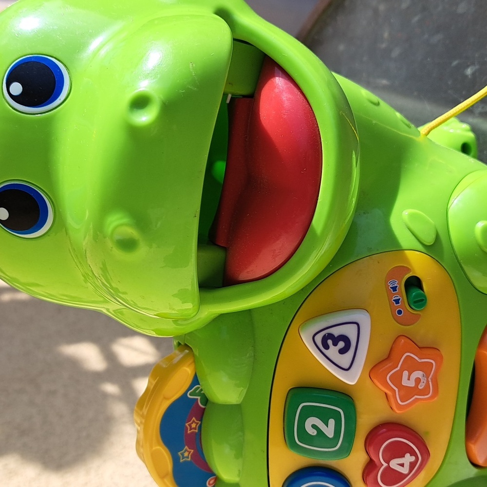 V tech chomp and count Dino, shapes and coins not included